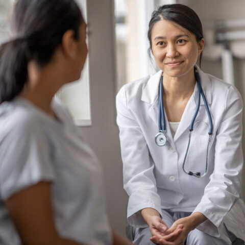 Doctor listens to patient